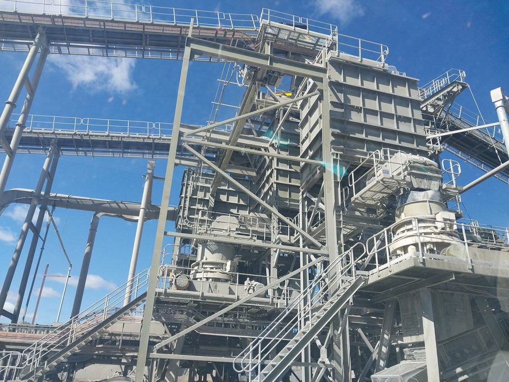 Licensed Occupational Hygienist conducting silica dust air monitoring at a mine site
